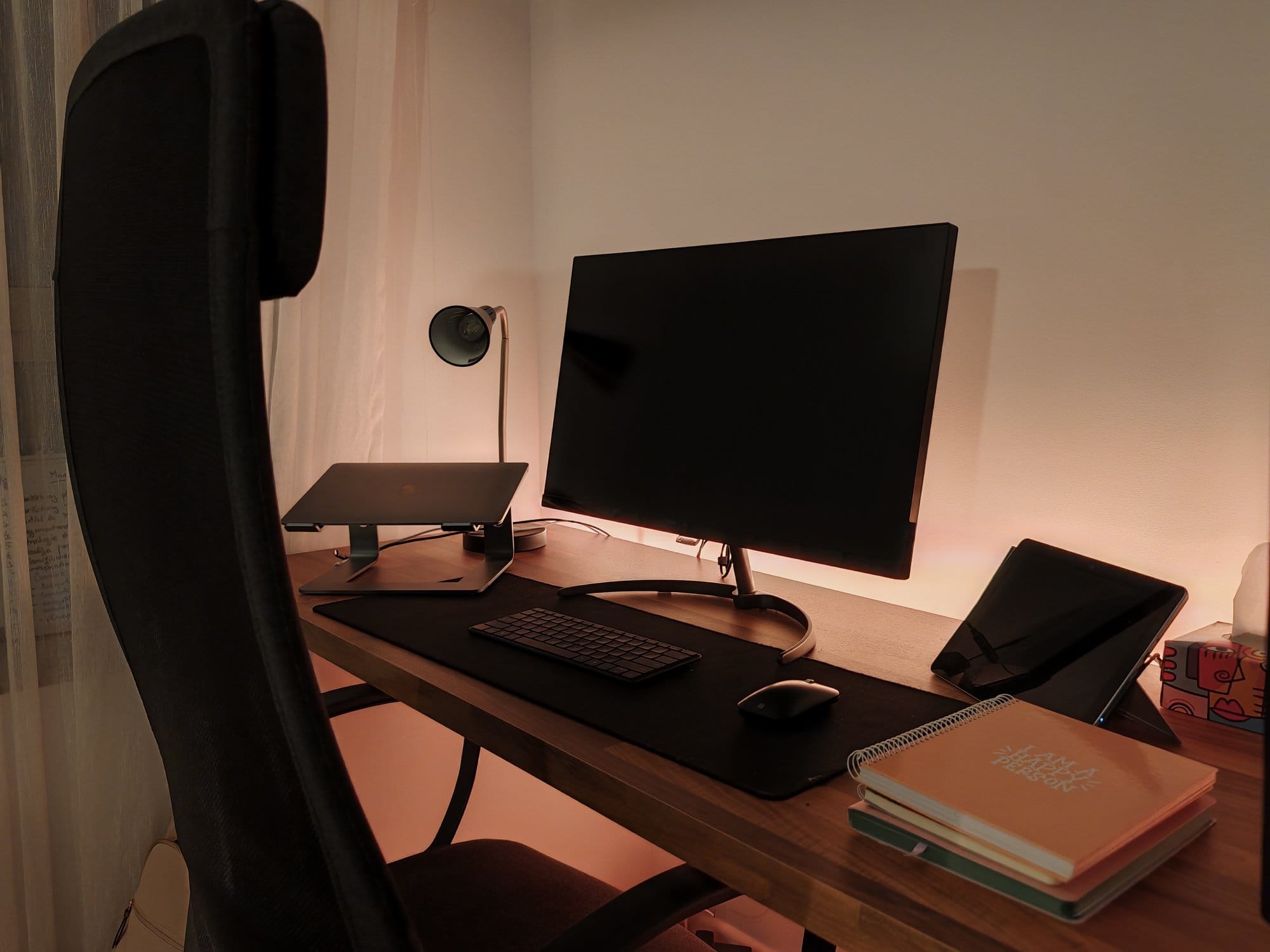 A desk setup with Philips IPS 27″ 4K UHD and IKEA laptop stand